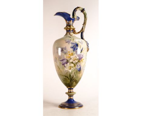 A large Royal Worcester gilded ewer, hand painted with flowers by F Roberts, mask heads to handle, h.45.cm. 