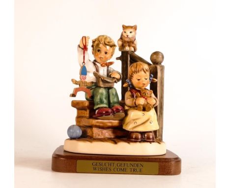 Goebel / M I Hummel Club exclusive 2000 - 2001 figurine "Wishes do come true" stands on a wooden base. Height 20cm. Boxed wit