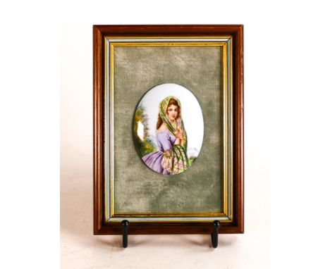 19th century oval porcelain plaque with hand painted half body portrait of a young lady wearing a Tartan shawl. Size incl. fr