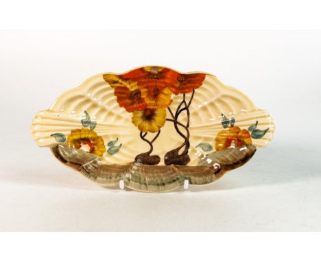 Clarice Cliff, ribbed dish in the 'Rhodanthe' pattern, hand painted in brown and orange shades depicting stylised tree landsc