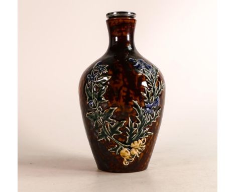 Doulton Lambeth Stoneware Whisky decanter. Decorated with Thistle and flowers, roots included, in relief. Included is a non-m