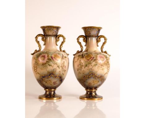 Carlton ware Ivory Blushware twin handled Baluster vases in the Arvista pattern with Cobalt blue ground base with gilt bands 