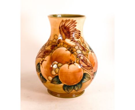 Moorcroft large vase decorated in the Finch and Berries design on light brown ground, C1990, h.24cm. 