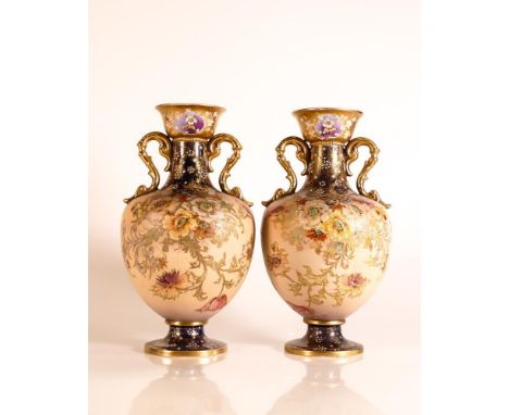 Carlton ware Ivory Blushware twin handled Baluster vases in the Old Anemone pattern with Cobalt blue base and neck. Gilt and 