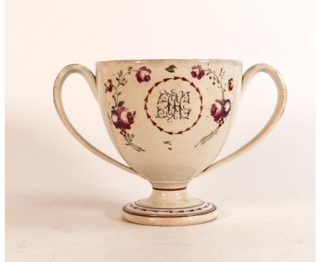 19th century English Pearlware Loving Cup with overglaze puce, red and green enamel rose sprays on socle foot. Likely made in