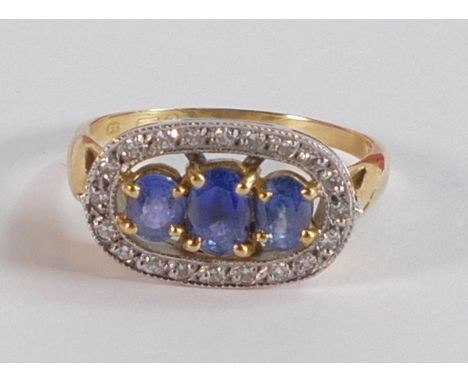 18ct gold ladies ring set with three oval sapphires and oval set diamond cluster, ring size P, 5.3g. 