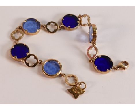 9ct gold bracelets set with light and dark blue circular glass roundels each decorated with cupids holding hands, total weigh