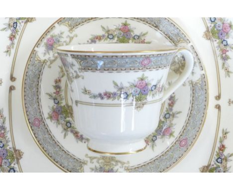 A collection of Minton Persian Rose tea and dinnerware, including tea set, large platters, tureen &amp; cover, various plates