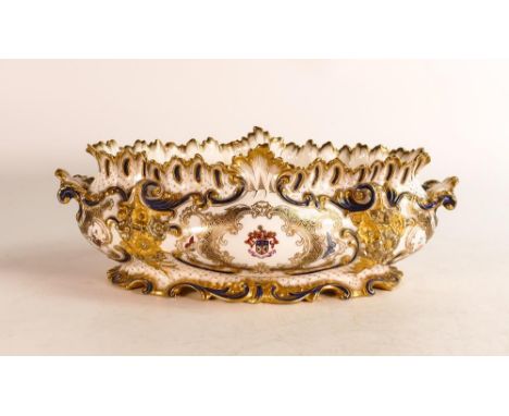 A Royal Worcester Armorial centrepiece bowl produced for the Walker family. Reserves bear the coat of arms for the Walker fam