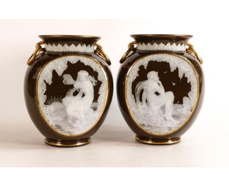 Handed pair of Brown-Westhead, Moor vases with pate-sur-pate decoration by Frederick Schenk, signature to one. (ref: The Art 