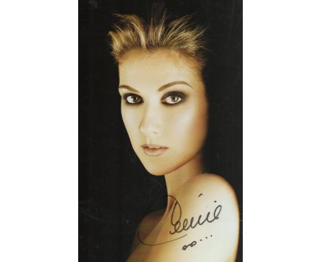 Celine Dion signed 8x6 inch approx. colour promo photo. Good condition. All autographs come with a Certificate of Authenticit