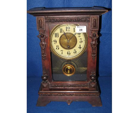 Early 20th Century American mantle clock with figural mounts.