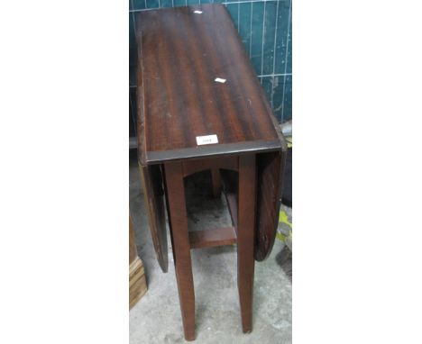 Modern mahogany gate legged table.