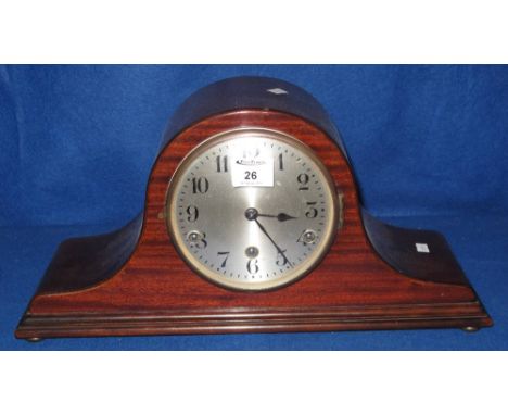 Mid 20th Century hat shaped mantle clock with three train movement and silvered face.