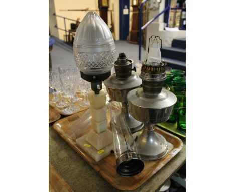 Pair of Aladdin oil lamps together with an art deco design lamp on onyx base. (3)