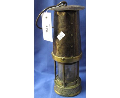 Original brass miner's safety lamp stamped: 'Davis Kirkby'.