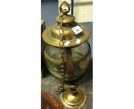 Oxidised metal barrel shaped glazed hall lantern with chain and ceiling fixing.