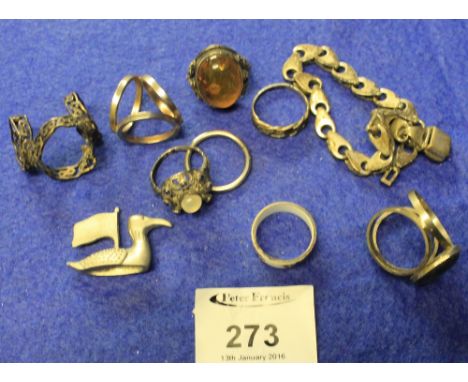 Collection of assorted white metal jewellery to include: Celtic band rings; costume and dress rings; bracelet; duck ornament 