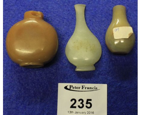 Three small Chinese carved hardstone items to include: miniature flat section vase; solid vase shaped ornament and a small cu