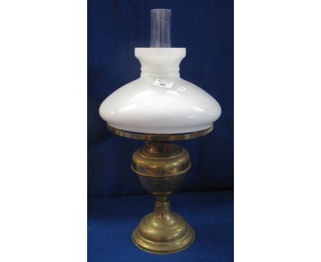20th Century brass double burner oil lamp with white glass shade and clear chimney.