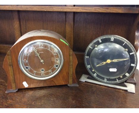 A walnut cased mantle clock together with a Temco electric mantle clock.