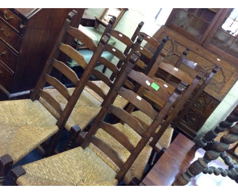 Set of six ladder back reproduction oak kitchen chairs signed with Beatle.