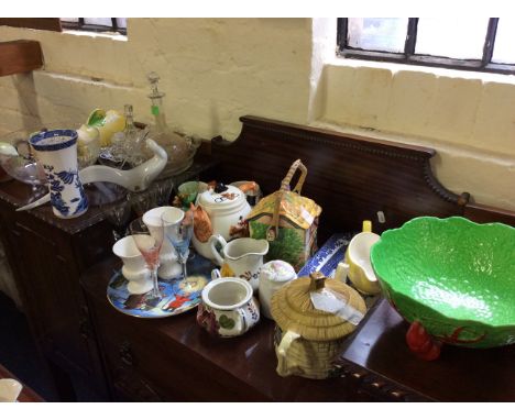 A selection of various items to include Carltonware, Clarice Cliff pot with lid (AF) etc.