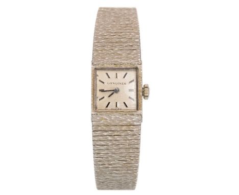 LONGINES NINE CARAT WHITE GOLD MANUAL WIND WRIST WATCH, the square dial with baton hour markers, 14mm case with personal insc