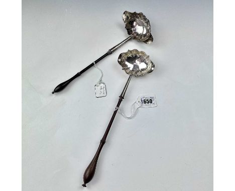A George III silver toddy ladle with serpentine bowl, London 1769, with turned fruitwood handle; together with a similar Geor