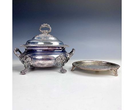 A George III Old Sheffield Plated oval tureen and cover, with gadrooned rim and raised on four scroll feet, width 20cm; toget