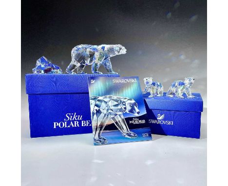 A Swarovski Crystal Siku Polar Bear, with ice boulder inscribed and dated 2011, with box and certificate, height 8cm, and wit