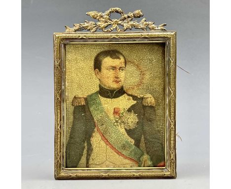 A 19th century miniature colour print depicting Napoleon, within rectangular cast brass frame, height 12cm.