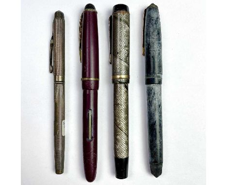 A modern silver engine turned pen by Walker &amp; Hall, Birmingham 1964, weight 11.1g; together with three vintage fountain p