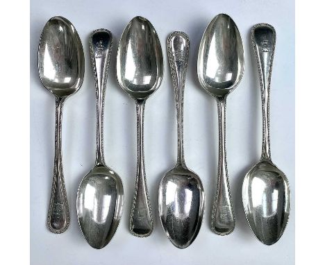 A Victorian set of four Old English Beaded pattern dessert spoons by Henry Wilkinson &amp; Co, Sheffield 1886; together with 