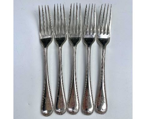 A set of four Victorian silver Old English Beaded pattern dessert forks by Henry Wilkinson &amp; Co, Sheffield 1886; together