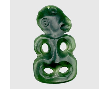 A Maori anthropomorphic hei-tiki pendant, green nephrite jade, the head tilted left, suspension hole through the top of the h