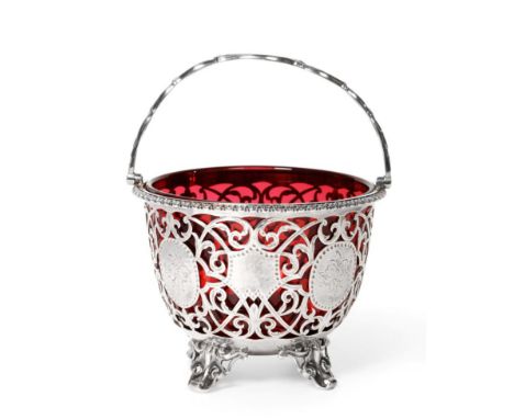 A Victorian Silver Swing-Handled Sugar Basket, George Richards & Edward Brown, London 1866, the pierced bowl with oval floral