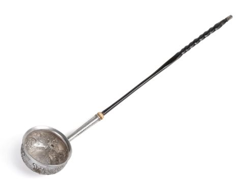 A George II Commemorative Silver Ladle, unmarked, circa 1757, the circular bowl chased with C scrolls and fruiting vines, the
