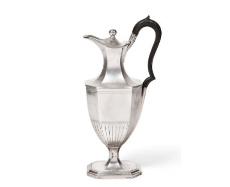 An Edwardian Silver Wine Ewer of George III Style, George Howson, Sheffield 1902, of pedestal form with hexagonal body and fo