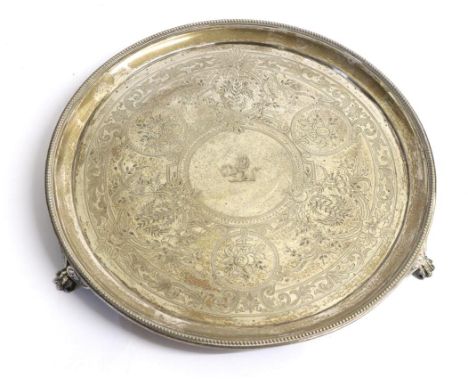 A Victorian Silver Salver, Frederick Elkington, London 1874, circular with bead border, engraved with panels of flowers and f