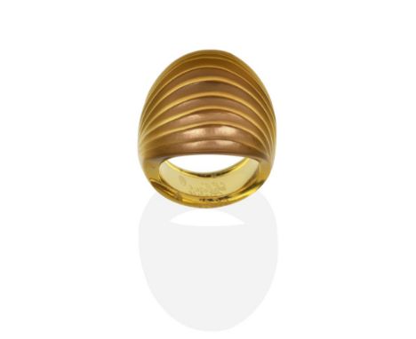 A Moulded Brown Glass Ring, by Lalique, as a ribbed dome, finger size N, the top measures 2.2cm by 1.5cm,  in a Lalique box s