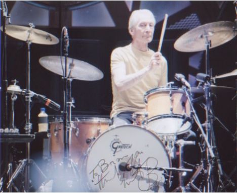 Rolling Stones - Charlie Watts. A 10x8 picture of Watts behind the drums. Excellent.  Good condition.  All items come with a 