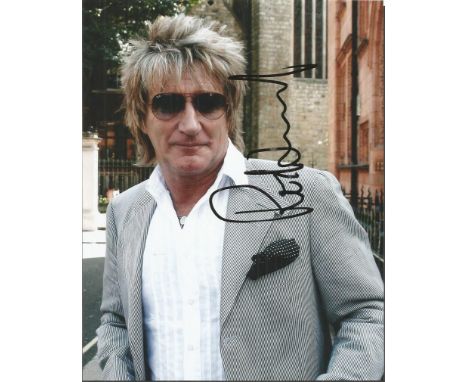 Rod Stewart signed 10 x 8 colour portrait photo in smart suit and sunglasses Good condition.  All items come with a Certifica