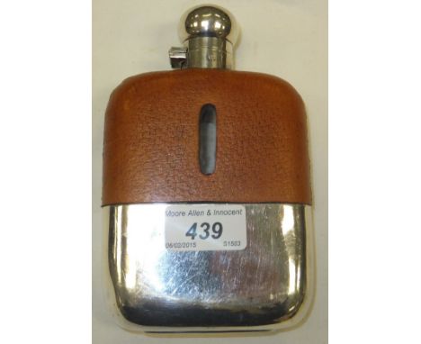 A hip flask by James Dixon & Sons with plated mounts and leather covering