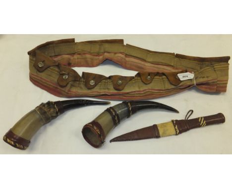 Two circa 1920's Sudanese powder horns, a similar tribal knife and a leather and fabric ammunition belt (possibly Canadian In