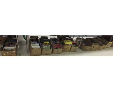 Eleven boxes of books relating to cricket to include "All in the Game" by R C ROBERTSON Glasgow, "Close of Play" by ALAN MILL