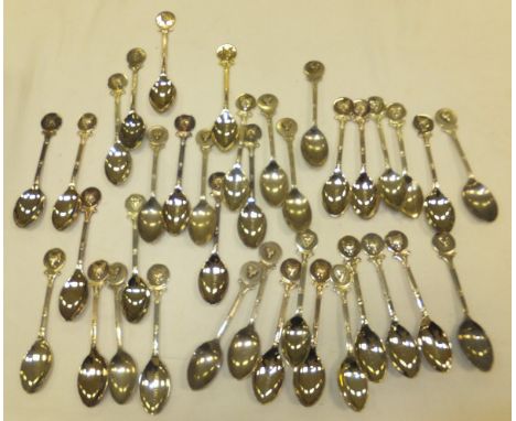 A collection of 37 puppy walking spoons, each with fox mask to the finial CONDITION REPORTS Length of spoons approx. 11 cm ea
