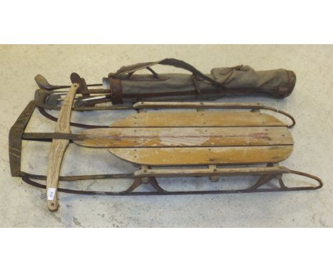 A vintage American sledge stamped beneath "Genuine Flexible Flier with Safety Runners and Super Steering Made in USA by S.L. 