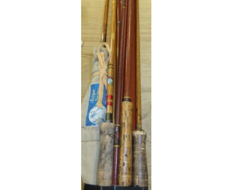 A collection of four vintage fishing rods to include a JJS Walker-Bampton two piece split cane trout fly rod, two further spl