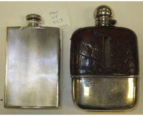 A silver mounted hip flask (Sheffield, 1918), with leather cover, together with a plated hip flask (2)